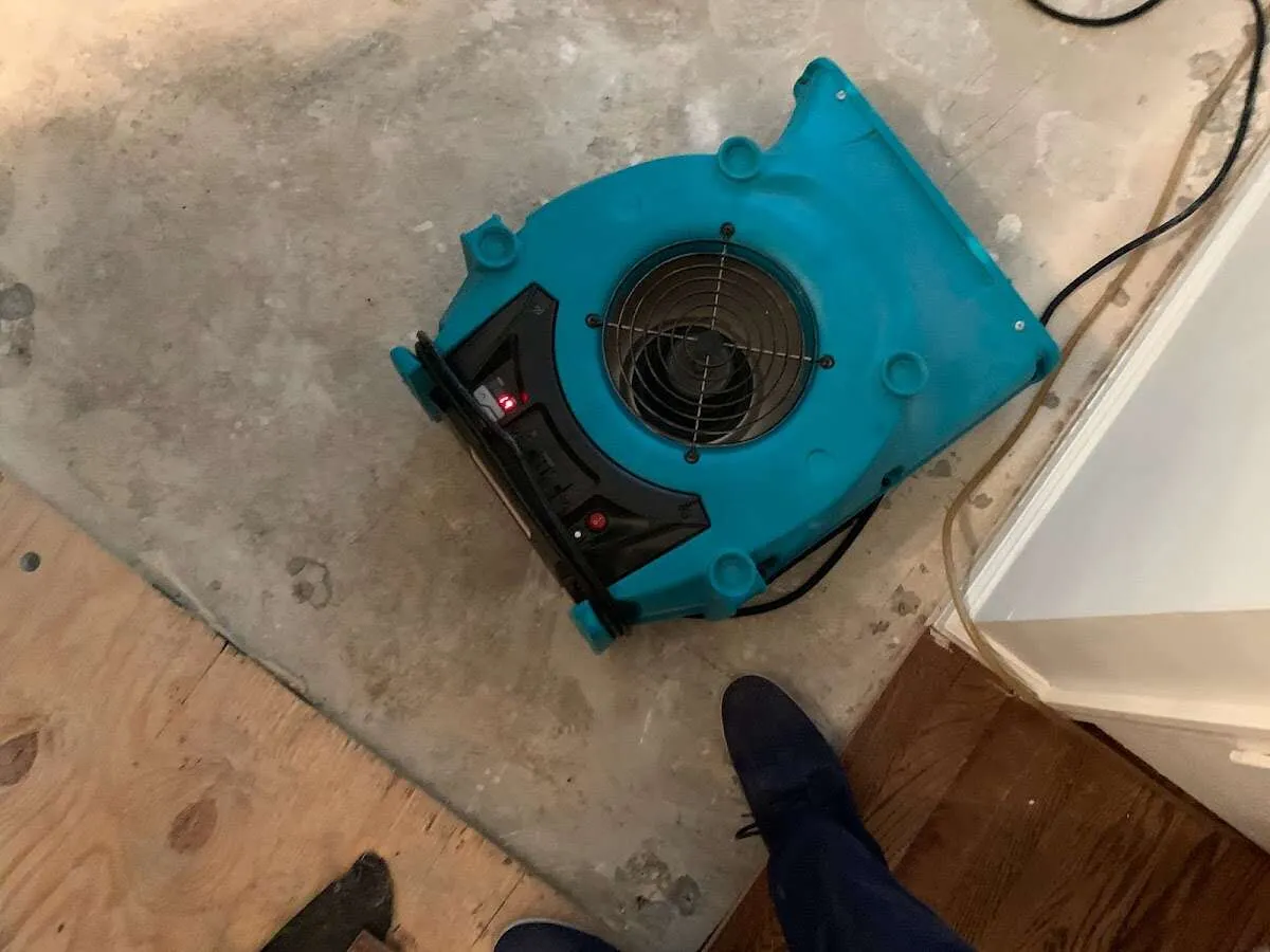 Air mover drying subfloor during Leak Detection & Repair in Corona de Tucson